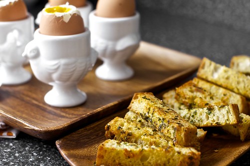 soft eggs with buttery herb-gruyere toast soldiers