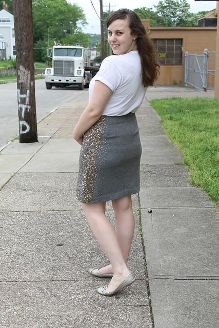 Daytime sequins outfit: wool sequined pencil skirt from Anthropologie, silver flats, boyfriend's t-shirt, brass and glass J. Crew necklace