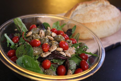 Mixed Greens with Lemon Garlic Olives, Grape Tomatoes, and Marcona Almonds