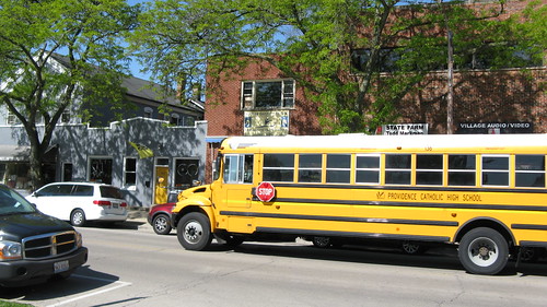 A school bus heading south on Ridge Avenue.  Wilmette Illinois. May 2012. by Eddie from Chicago