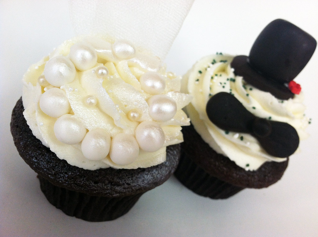 These cute wedding cupcakes are by cupcake bakery Cupcake Charlie's in Cape
