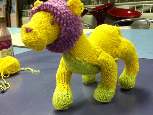 Knitted in the round intarsia toy lion improvised freeform knitting yellow