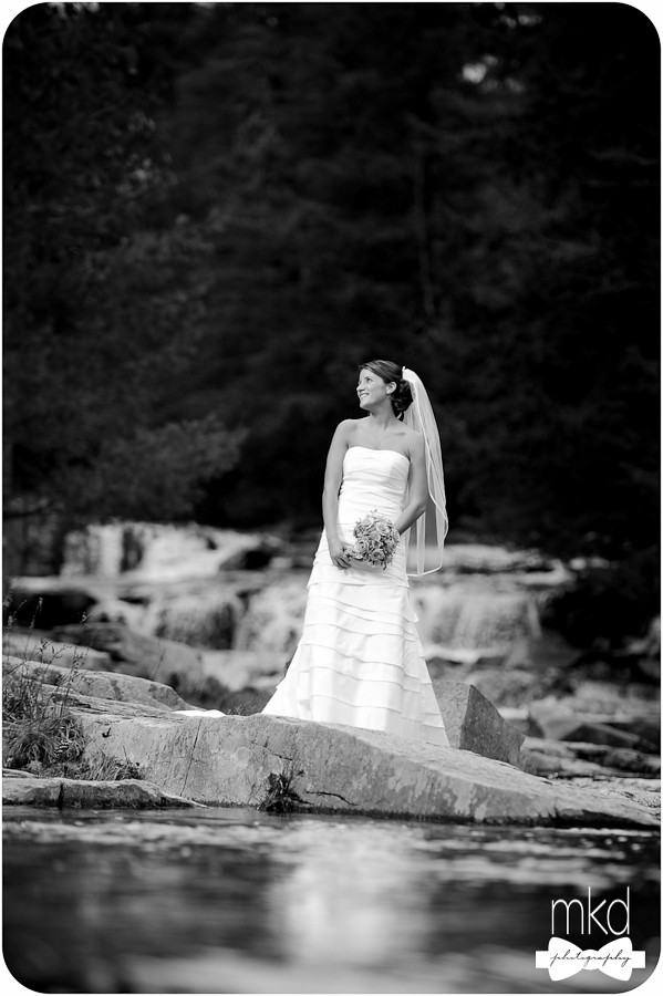 Bride standing in the waterfalls - Jackson, NH