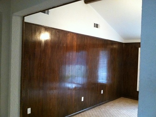 Before, living room with paneling