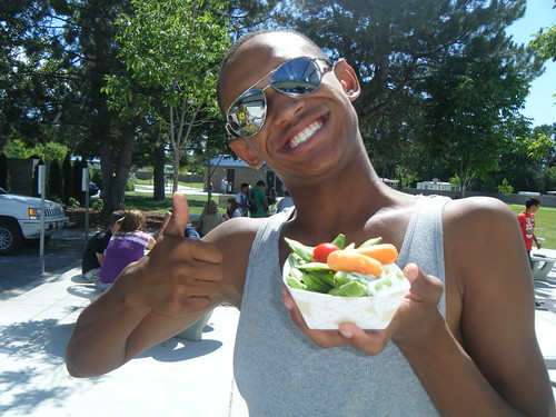 A teen attending the summer food service site at the Boys and Girls Club of Ada County in Garden City, Idaho enjoys a healthy snack.