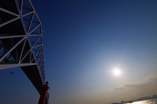 sun reflecting Tokyo Gate Bridge