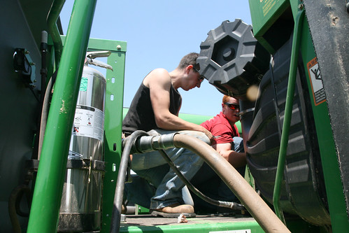 Dave and Callum fuel up the combine.