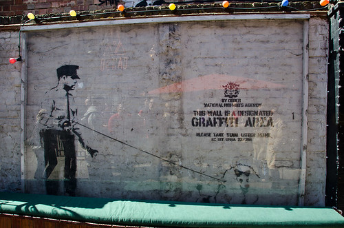 Banksy behind plexiglass - East London Street Art
