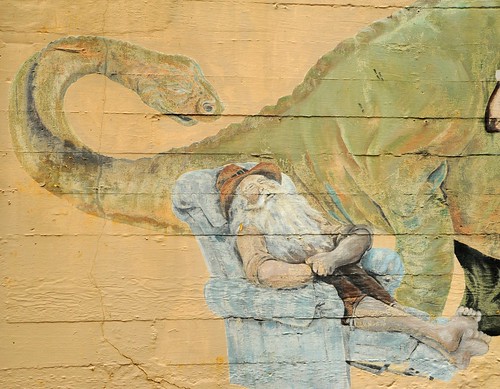 Rip Van Winkle sleeping in a Lazyboy, and dinosaur, alley art, mural, Aberdeen, Grays Harbor, Washington, USA by Wonderlane
