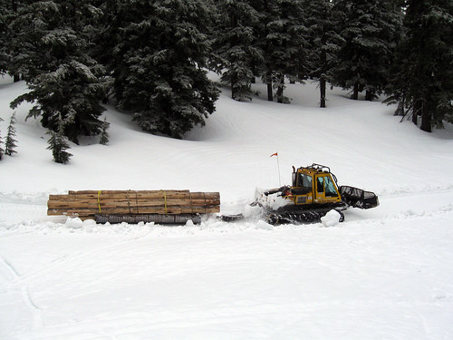 Employees and volunteers on the Deschutes National Forest devised an oversized sled from a discarded culvert on skis made from roadside guardrails to haul equipment to an elevation of 6,700 feet where they built a shelter. (US Forest Service photo)