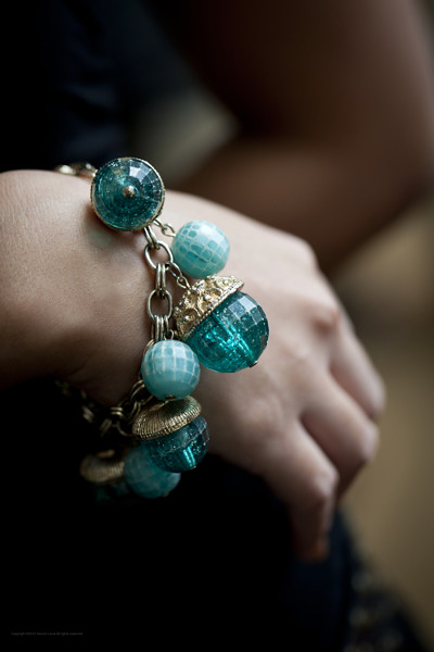  1960s charm bracelet with faceted turquoise baubles.
