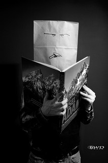 Paper Bag Man Reads Ansel Adams