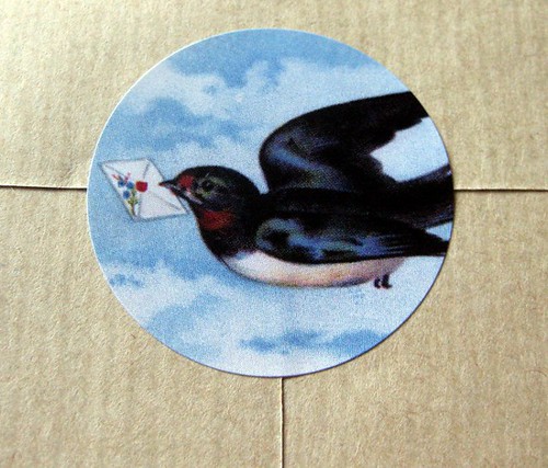 Letterbird seal on brown paper envelope