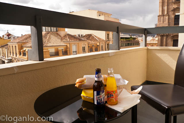 Food and drink on a balcony on the AC Hotel overlooking, Malaga, Spain