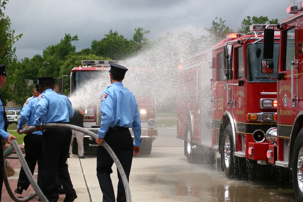 Fire Department dedicates new engine and heavy rescue with ceremonial wet-down