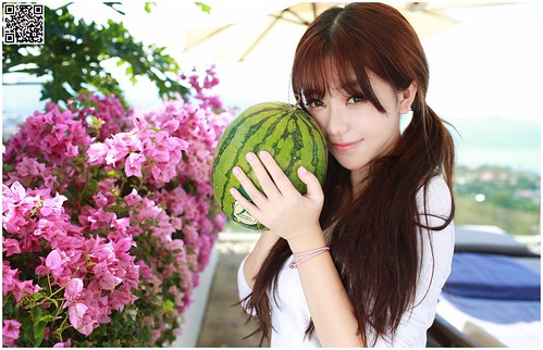 Chinese girl eating watermelon