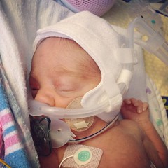Avery gets to test out a new Cpap machine. Sweet hat! #twins #preemie
