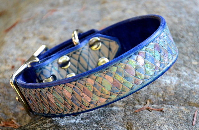 Rainbow Fish Iridescent Leather Dog Collar carved out of vegetable tanned leather. Shimmer and sparkle paints were hand painted onto the scales to add sparkle to the leather dog collar. The leather dog collar was inspired by Marcus Pfister Rainbow Fish children's book.