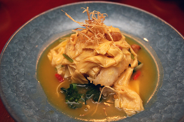 Simmered Fillet of Star Garoupa with Beancurd Skin and Wolfberries in Carrot Broth