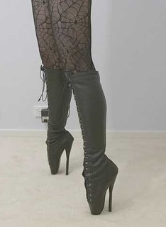 legs in stockings and stiletto boots