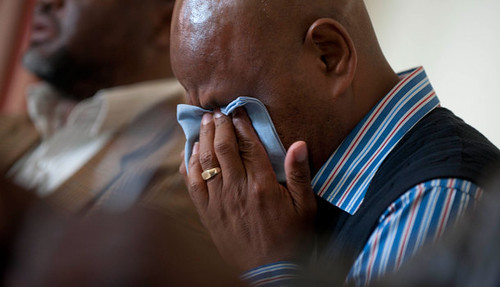 Association of Mineworkers and Construction Union (AMCU) President Joseph Mathunjwa weeps over the disastrous violence that has left 44 people dead around Lonmin platinum mines. AMCU has blamed the National Union of Miners for the violence. by Pan-African News Wire File Photos