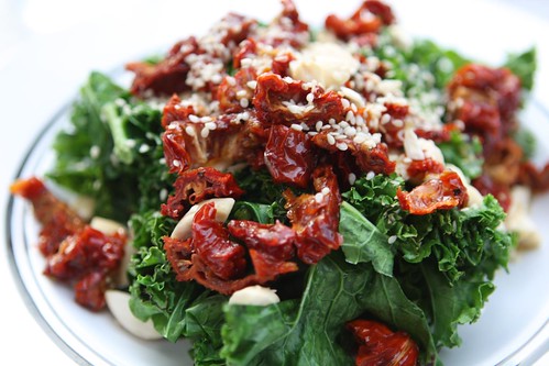 Grilled Kale Salad with Sundried Tomatoes, Almonds, and Sesame Seeds