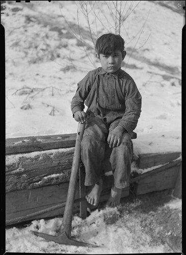 Scott's Run, West Virginia. Miner's child - This boy was digging coal from mine refuse on the road side, 1936