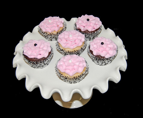 light pink and black ruffle cupcakes for a baby shower