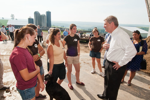 From left: Ashley Stoltzfus, Justine Stoltzfus, “Dixie”, Gail Stoltzfus, Madison Stoltzfus and U.S. Department of Agriculture (USDA) Secretary Tom Vilsack discuss their mutual love of man’s best friend during Secretary Vilsack’s visit to the Stoltzfus’ Pennwood Dairy Farms in Berlin, Pennsylvania, on Tuesday, July 17, 2012. During Secretary Vilsack’s visit he highlighted the United States Department of Agriculture's energy efficiency programs and announced a new effort to help rural consumers make affordable, energy-efficient improvements to their homes and businesses. USDA photo by Bob Nichols.