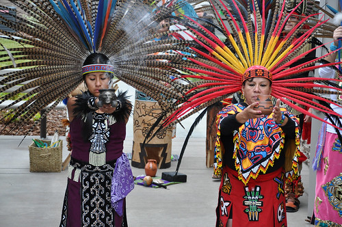 Dancers wearing indigenous Mexican regalia perform a traditional blessing at the grand opening of the Castle Rock Apartments in Boardman, Oregon, where 62 percent of the population is of Hispanic descent. The ceremony offered thanks to farm workers and likened the new apartment complex to a seed sprouting from the ground to bear fruit for the community.