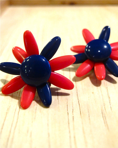  Adorable 1950s plastic floral earrings with adjustable petals! Marked " West Germany"