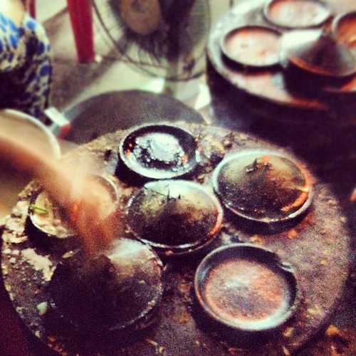 Something delicious baking under those lids. #StreetFood #NhaTrang #Vietnam #travelingram