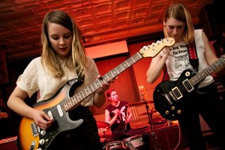 the members of Potty Mouth playing a show