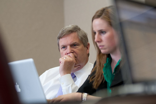 Agriculture Secretary Tom Vilsack responds to questions, with the assistance of Office of Communications Director of Web Communications Amanda Eamich, during the first Virtual Office hours live "Twitter" session held at the U.S. Department of Agriculture in Washington, D.C., on Thursday, April 4, 2012. USDA photo by Lance Cheung.