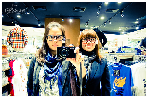 trying out the specs at uniqlo