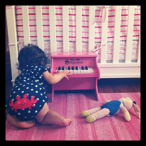 Tuning her piano. 