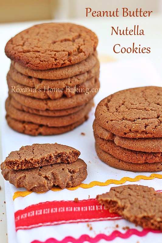 Easy, melt in your mouth peanut butter cookies taken to a whole new level by adding some Nutella to the cookie dough. Recipe from Roxanashomebaking.com