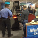Attendees take video of CNC Plasma demonstration at Fabtech