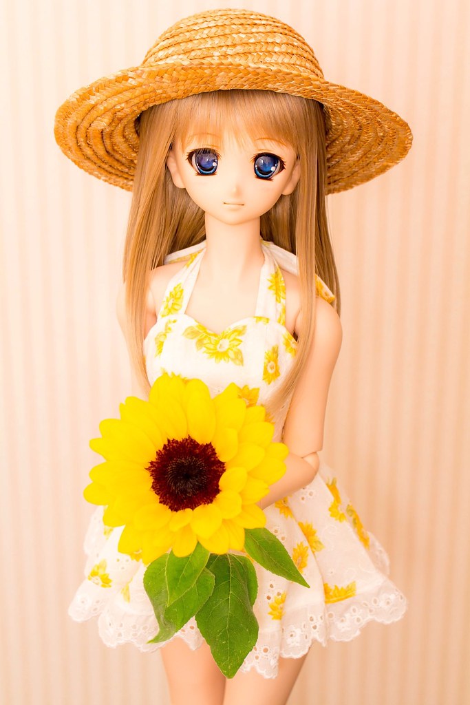 Girl with little sunflower