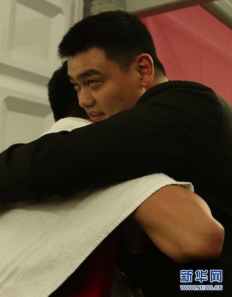 August 6th, 2012 - Yao Ming consoles Chinese basketball player Wang ZhiZhi after the Chinese 5th and final loss of the Olympic games in London