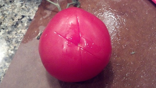 Getting Ready to Take the Skin off the Tomato