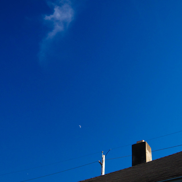 Roof, Chimney, Power Lines, Moon, and Some Clouds