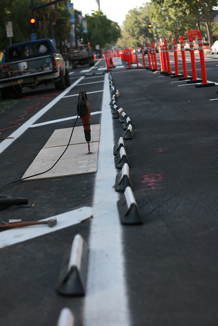 rubber curbs installed 4th street Cycletrack