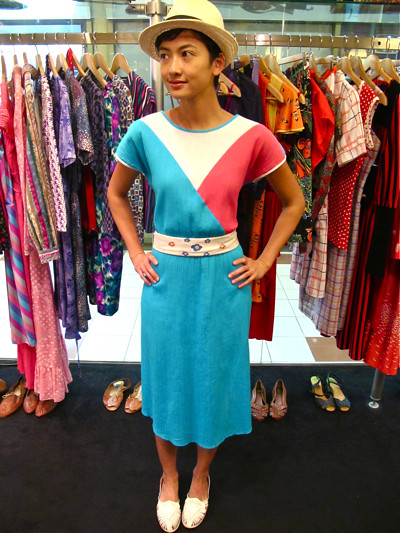 Go Angle-manic with this bold 1980s tri-coloured dress, worn belted with a hand-painted silk scarf. Size S/M.