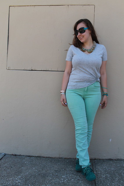 Green with envy outfit: turquoise moccasins, mint green BDG jeans from Urban Outfitters, heather gray v-neck pocket t-shirt from Gap, Marc by Marc Jacobs sunglasses, "Sparkled Agate Bib Necklace" from Anthropologie, etc.