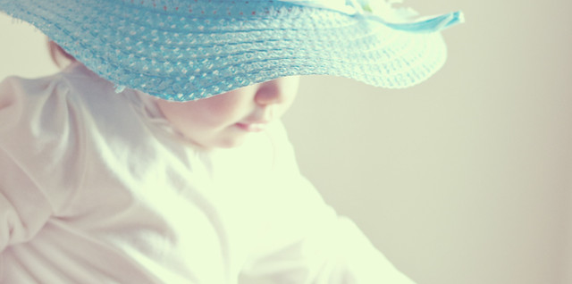 Little Girl in Blue Hat by Mary Banducci