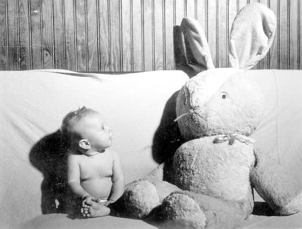 Sharon Monts-DeOca looks at stuffed rabbit she was given on her first Christmas: Jacksonville, Florida