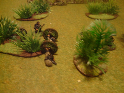VC taking casualties in cover