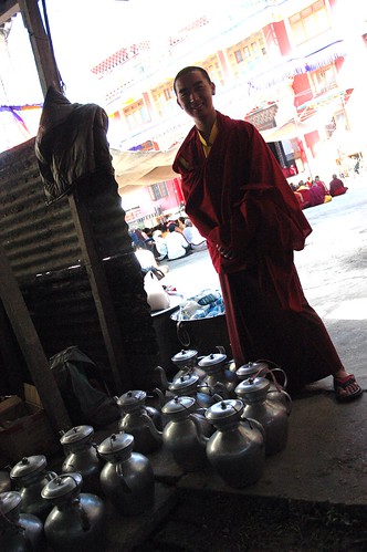 Tibetan monk friend, tea pots in the makeshift kitchen, Sakya Lamdre, Tharlam Monastery of Tibetan Buddhism, bright sunny day, Bodha, Kathmandu, Nepal by Wonderlane