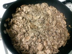 Rabbit Meat Pulled and simmered in crockpot juices